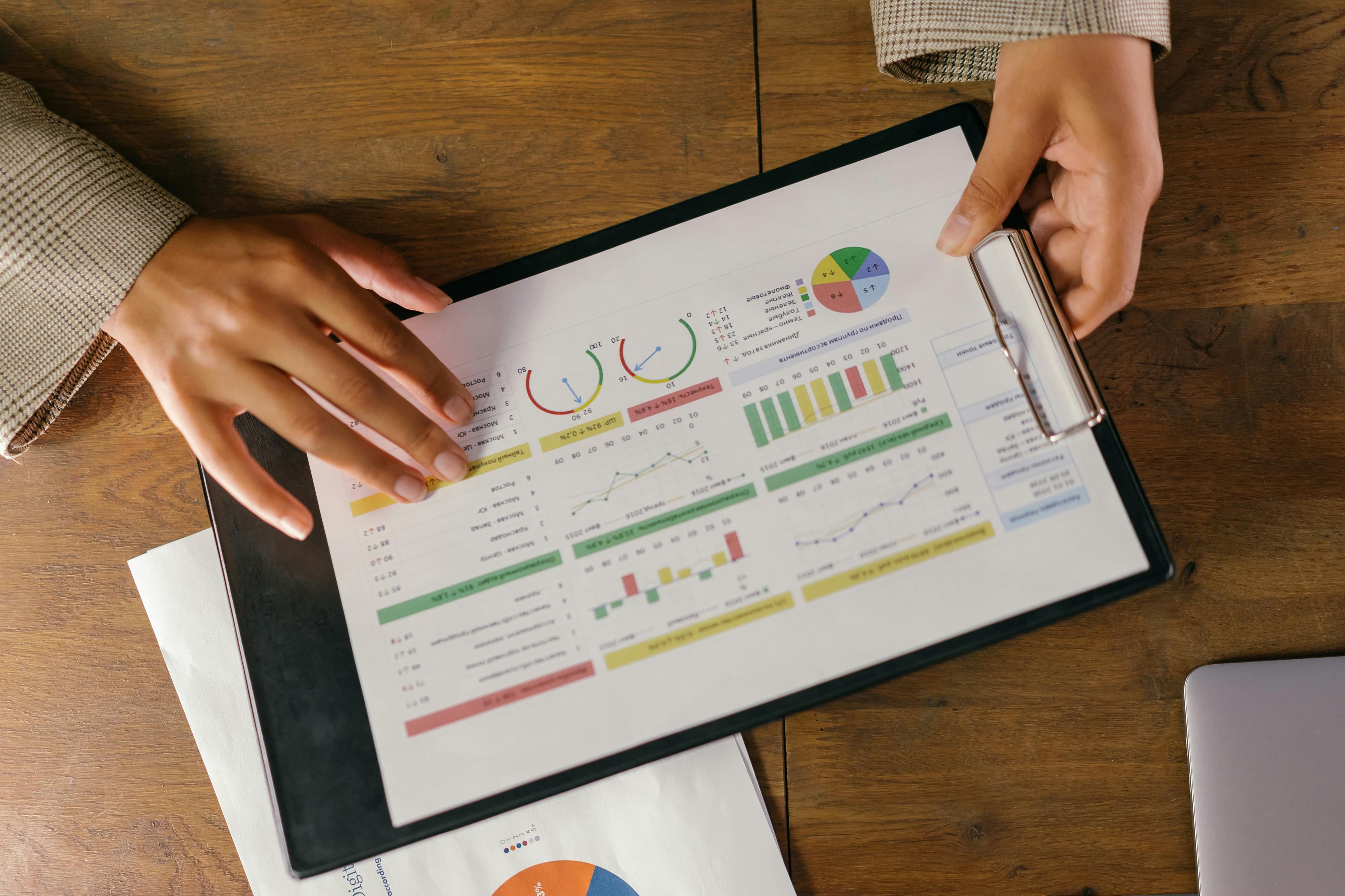 A sleek, modern office interior with large screens displaying complex data visualizations and analytics dashboards.